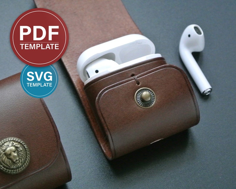 May include: A brown leather case with a snap closure for holding a pair of white wireless earbuds. The case has a decorative metal button on the front.  The earbuds are shown next to the case.