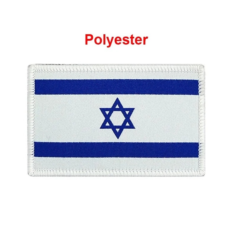 May include: A white patch with a blue Star of David and two blue stripes. The patch is made of polyester and has a white stitched border.