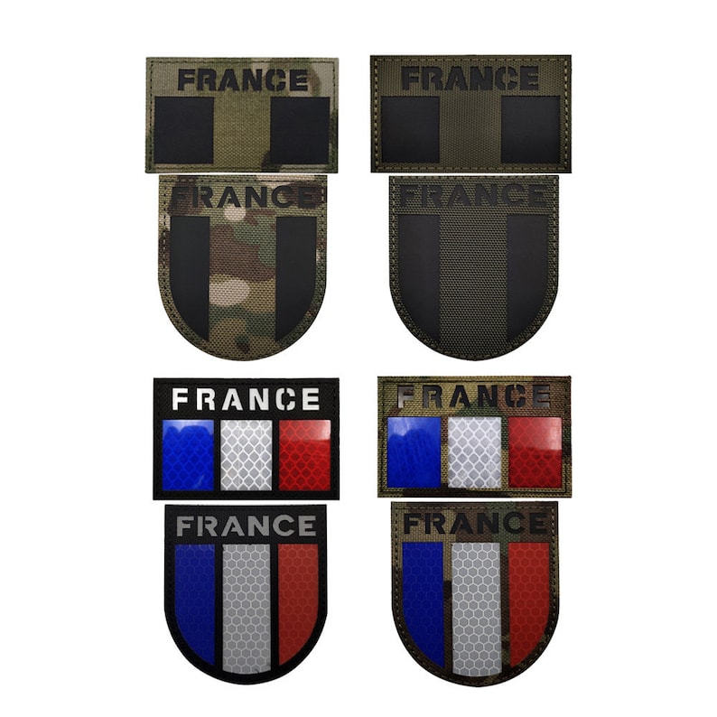 May include: Set of six embroidered patches featuring the French flag and the word "FRANCE" in black text. The patches are in various shapes and sizes, including rectangular and shield-shaped. Some patches have a camouflage background, while others have a solid green background.