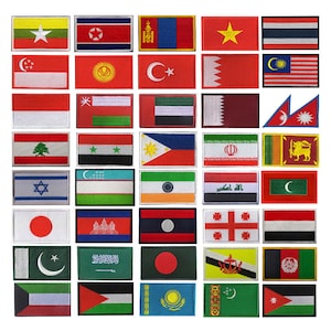 May include: A collection of 40 embroidered fabric patches featuring the flags of different countries. The patches are rectangular and have a white border. The flags are arranged in rows of five.