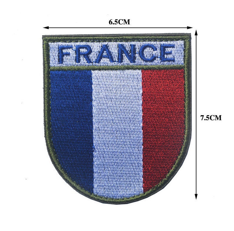 May include: Embroidered patch featuring the French flag in blue, white, and red with the word "FRANCE" above the flag. The patch is 6.5 cm wide and 7.5 cm tall.