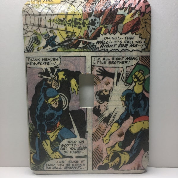 Cyclops and Havok of the X-Men have a brotherly fight on this switch plate cover!