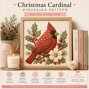 May include: A framed Kinusaiga pattern featuring a red cardinal bird perched on a branch with green holly leaves, red berries, and a white flower. The artwork is displayed alongside a ceramic pitcher, a candle, and three books.