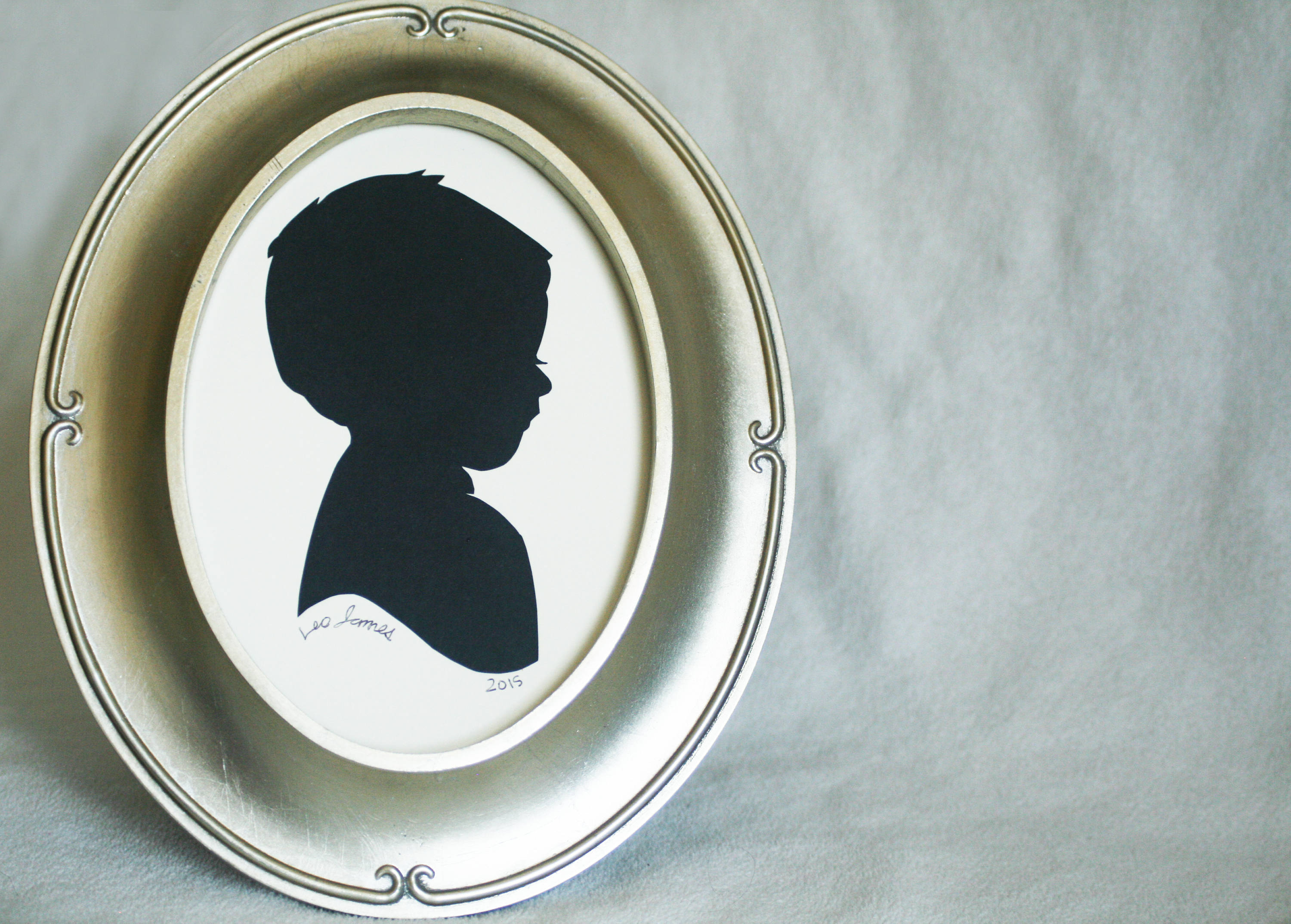 Multiple Custom child silhouettes handmade from cut paper