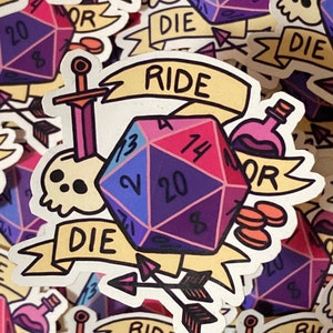 May include: A colorful sticker featuring a 20-sided die with the words "DIE" and "RIDE" on banners. The die is surrounded by a sword, arrows, and a potion bottle.