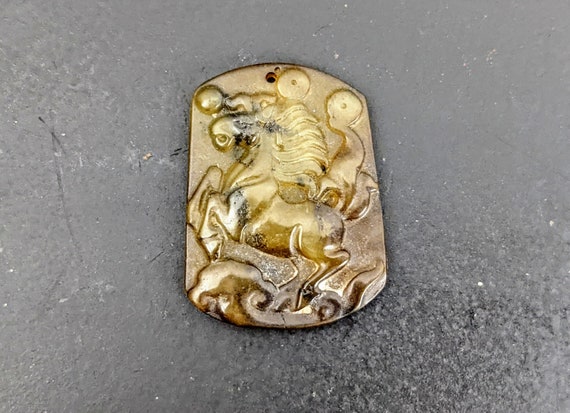 Chinese Carved Serpentine Pendant with Horse - image 1