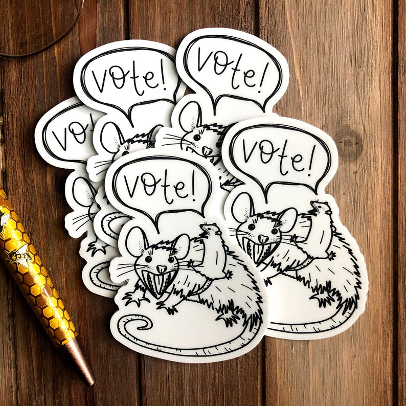 May include: Five white stickers with black line drawings of rats and the word "Vote!" in a speech bubble. The rats have large teeth and are drawn in a cartoon style.