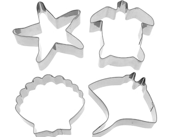 Ensemble d'emporte-pièces sur le thème des créatures de l'océan comprenant un outil de cuisson en forme de raies pastenagues, étoiles de mer et coquillages