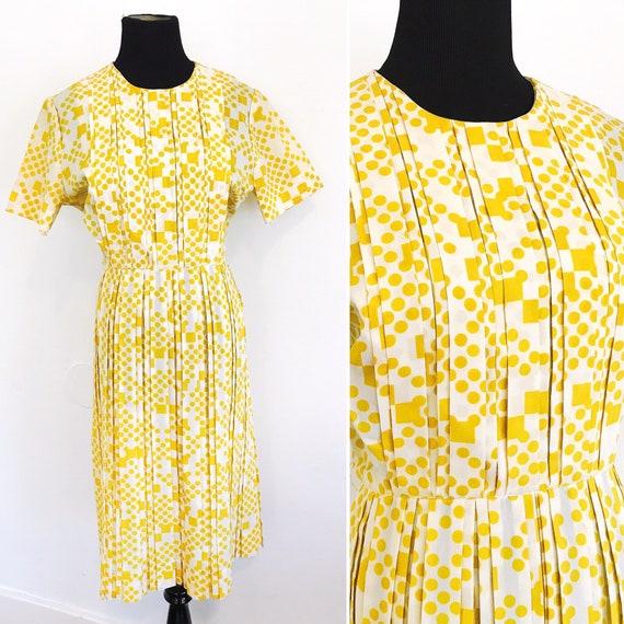 yellow polka dotted dress