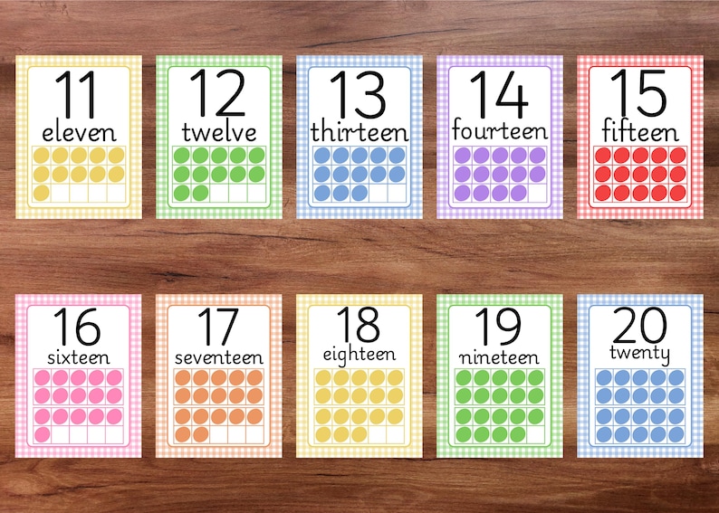 May include: Ten flashcards with numbers eleven through twenty. Each card has a number, the word form, and a ten frame with colored circles. The cards have a gingham border in various pastel colors, perfect for educational use.