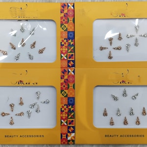 Guld- och silveransiktssmycken: Långa Bollywood Bindi-klistermärken