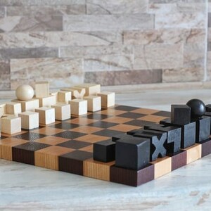 chess set handmade	large chess board	chess backgammon	chess board table	unique chessboard	modern checker board	patterned chessboard	chess set 3 in 1	exclusive chess	hand carved chess	Folding chess board	mid century ebony	decorative chess