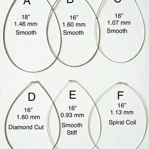 May include: Six silver-toned metal neck wires labeled A through F. A: 18 inches, 1.46 mm, smooth. B: 16 inches, 1.60 mm, smooth. C: 16 inches, 1.07 mm, smooth. D: 16 inches, 1.60 mm, diamond cut. E: 16 inches, 0.93 mm, smooth stiff. F: 16 inches, 1.13 mm, spiral coil.