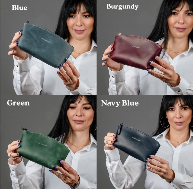 May include: Four different colored leather zippered pouches. The pouches are all the same size and shape. The colors are blue, burgundy, green, and navy blue.