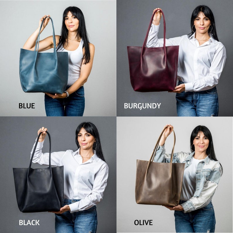 May include: Four leather tote bags in different colors: blue, burgundy, black, and olive. Each bag has a simple design with two top handles.