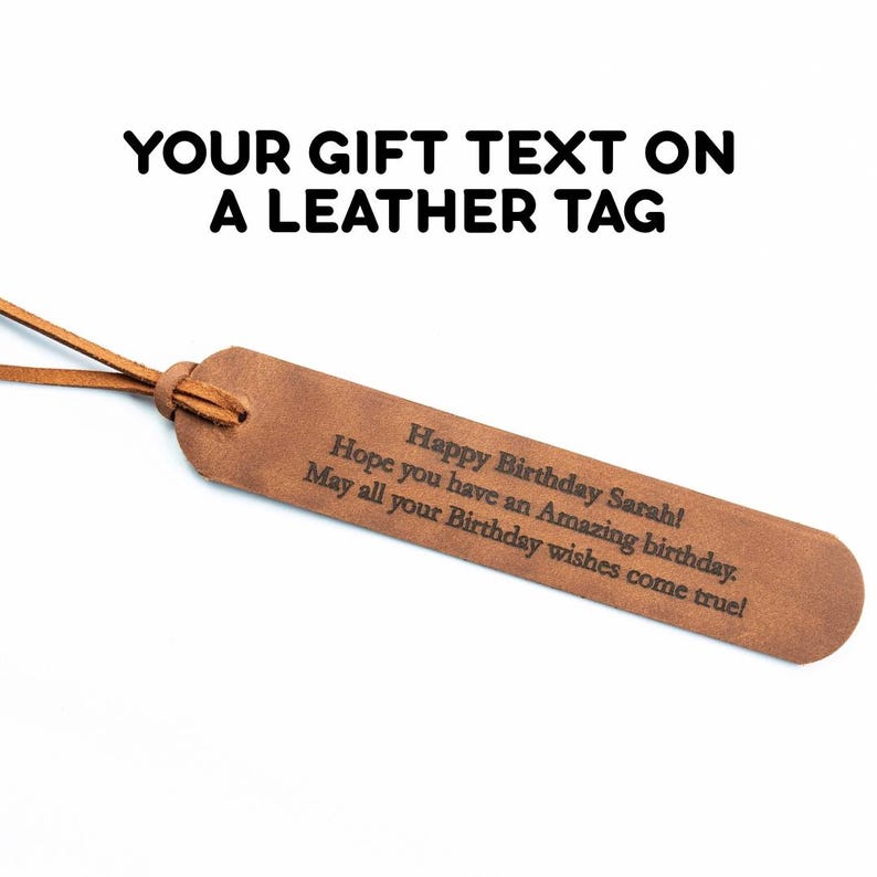 May include: A brown leather tag with the text "Happy Birthday Sarah! Hope you have an Amazing birthday. May all your Birthday wishes come true!" and a string attached. The text "YOUR GIFT TEXT ON A LEATHER TAG" is above the tag.