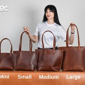 May include: Four brown leather tote bags of different sizes, labelled "Mini", "Small", "Medium", and "Large".
