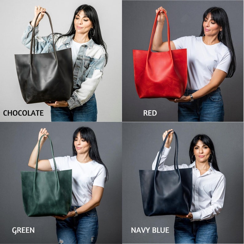May include: Four different colored leather tote bags. The bags are shown in chocolate, red, green, and navy blue.