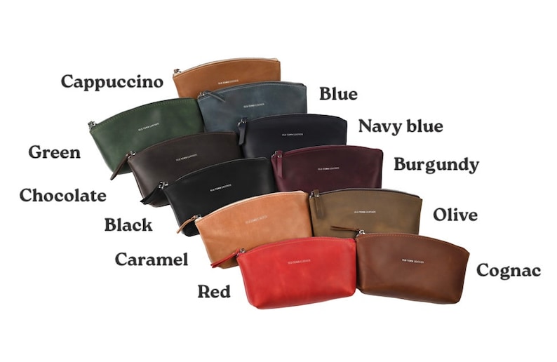 May include: A variety of leather cosmetic bags in different colors, including cappuccino, green, chocolate, black, caramel, red, blue, navy blue, burgundy, olive, and cognac.
