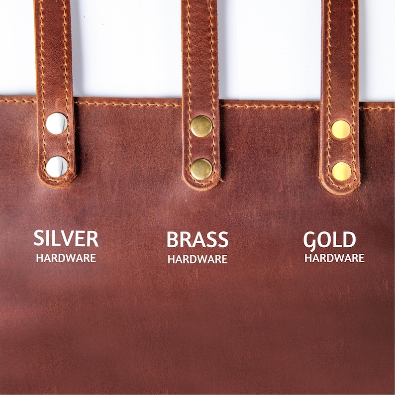 May include: Close-up of brown leather with three different colored metal hardware options: silver, brass, and gold. The text "HARDWARE" is below each option.