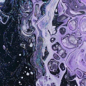 May include: Abstract painting with swirling purple and black paint with glitter accents.