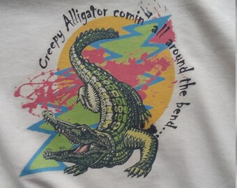 the shirt with the alligator on it