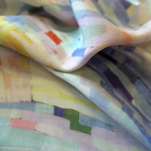 May include: A set of three ceramic mugs with a speckled, matte finish. The mugs are in shades of cream, light gray, and dark gray. Each mug has a simple, minimalist design, perfect for coffee or tea.