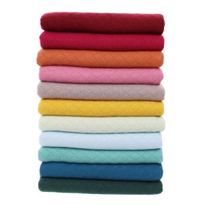Maglione isolante bifacciale in tessuto di jersey di cotone trapuntato a rombi