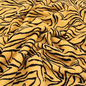 Animal Shimmer Jersey Lurex Zebra Stripes Stretch Print Jumper Fabric - Gold