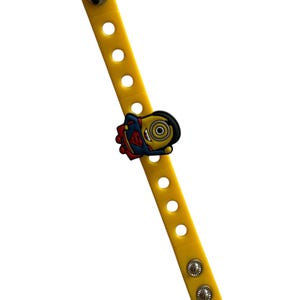 8 designs in minion rakhi with Roli n chawal