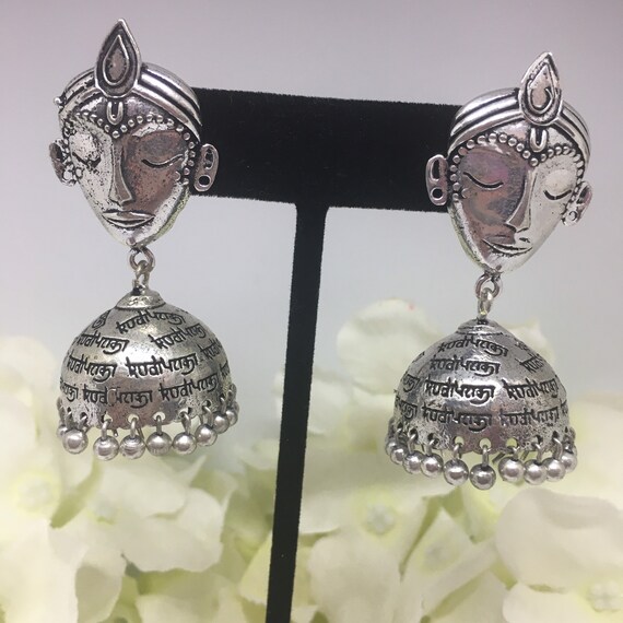 Jogan scripted German silver earring