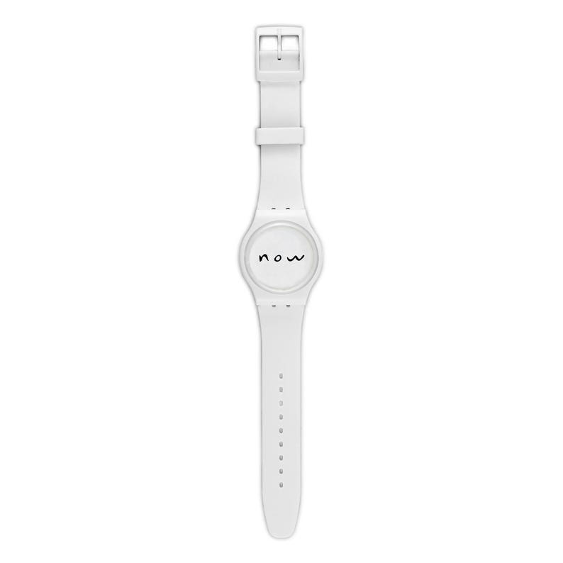 May include: A white wristwatch with a white band and a white face. The face of the watch has the word "now" written in black.