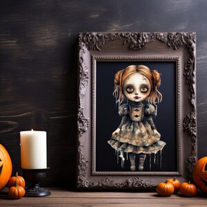 May include: A framed illustration of a spooky doll with long red hair, wearing a tattered dress and standing on a black background. The frame is brown with ornate details. The image is surrounded by pumpkins and a candle on a wooden surface.