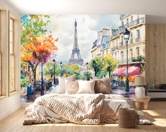 May include: A watercolor mural depicting a Parisian street scene with the Eiffel Tower, colorful trees, and buildings. The mural is installed behind a bed with neutral-toned bedding and decorative pillows, creating a cozy bedroom setting.