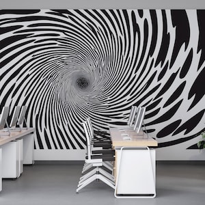 Peut inclure: Un espace de bureau avec une murale en spirale noire et blanche. La pièce comprend plusieurs bureaux avec des écrans d'ordinateur, des chaises blanches et une plante en pot. Le design crée une illusion d'optique.