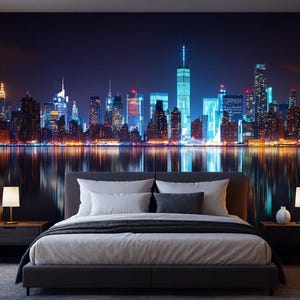 May include: A bedroom featuring a large wall mural of the New York City skyline at night, with the city lights reflecting in the water. The bed has white bedding and gray pillows, with two nightstands and lamps.