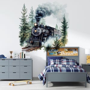 May include: A gray bedroom with a bed, a dresser, and a train engine wall decal. The bed has a gray headboard with a corkboard and the text "Dream" on it. The bed is covered with a blue and white plaid comforter. The dresser is gray with 12 drawers. The train engine decal is black and has a white smoke plume. The decal is surrounded by green trees.