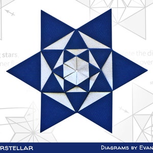 Może przedstawiać: Gwiazda origami w kolorze niebieskim i białym o złożonym wzorze geometrycznym. Gwiazda jest złożona w sposób tworzący efekt trójwymiarowy. Obraz zawiera tekst "INTERSTELLAR" i "DIAGRAMS BY EVAN ZODL".