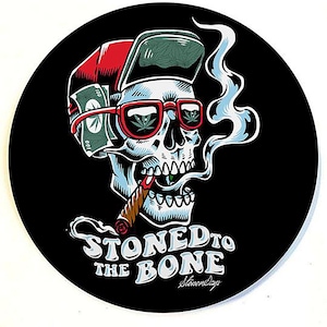 Stoned to the Bone Dab Mat by Stonerdays. 8&quot; round 1/4&quot; thick. Skull Trippy Blunt Dab Mats