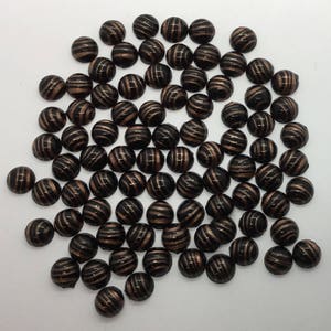 8mmn Round—Vintage  Hand Crafted —Made In India Glass Cabochon Stones— Opaque Black With Metallic Copper Stripe  Pattern —50pc each pack