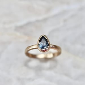 Sky Blue Pear Montana Sapphire |14kt Gold Solitaire Textured Engagement Ring | Sandcast—One-of-a-kind