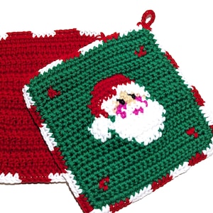 May include: Two crocheted Christmas potholders. One is red with white scalloped edges. The other is green with a Santa Claus face and red and white accents. Both have a loop for hanging.