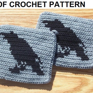 May include: Two crocheted pot holders with a black raven design on a light blue background.  PDF CROCHET PATTERN is written at the top of the image.