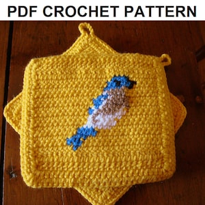 May include: Two yellow crocheted pot holders with a blue bird design. The bird has blue wings, a white body, and a brown head.