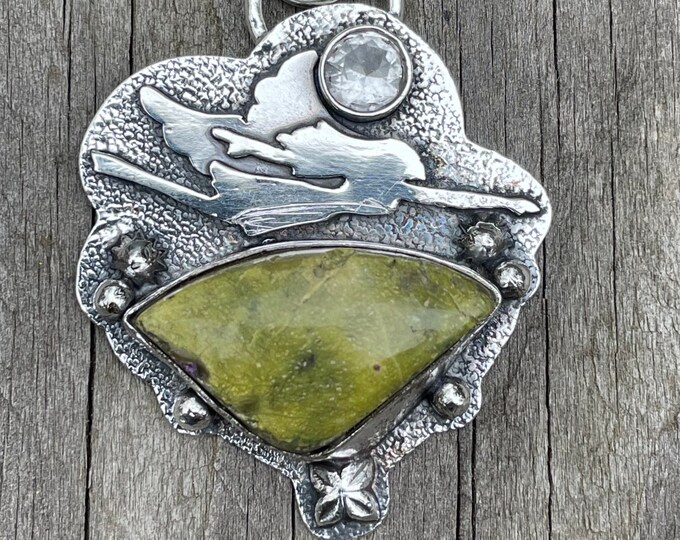 925 silver pendant with a stichtite stone and topaz decorated with a boho style silver girl