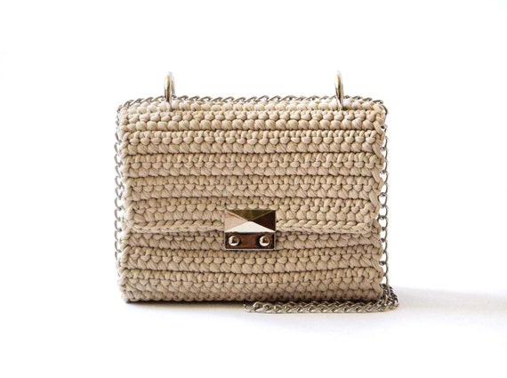 small beige clutch bag