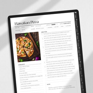 May include: A recipe card for Hawaiian pizza with a photo of a pizza on a wooden cutting board. The recipe includes ingredients like bacon, pineapple, and mozzarella cheese. The recipe card also includes instructions for making the pizza dough and assembling the pizza.