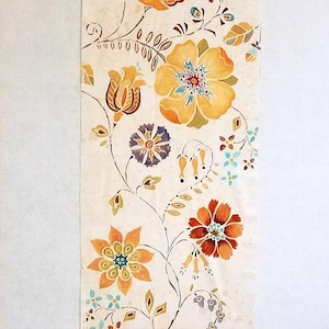 May include: A rectangular fabric panel with a floral design. The cream-colored background features orange, yellow, and blue flowers with brown stems and leaves. The top and bottom have a brown patterned border. The text "Cimber Design" is visible.