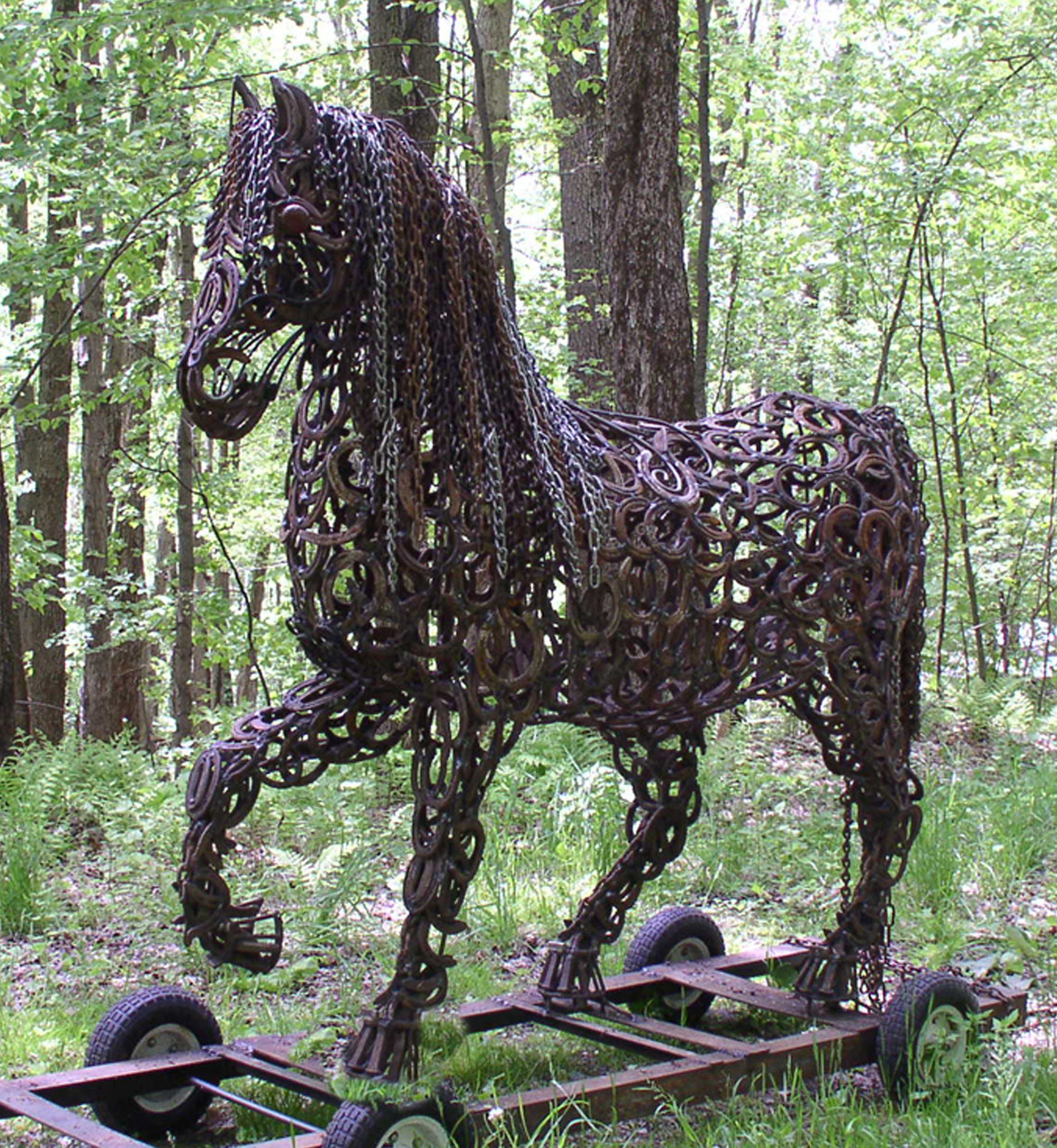 A lifesize horse made entirely from horseshoes.