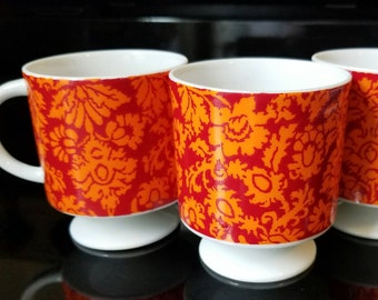 1968 vintage Holt Howard footed koffiemok set retro psychadelic ikat ontwerp